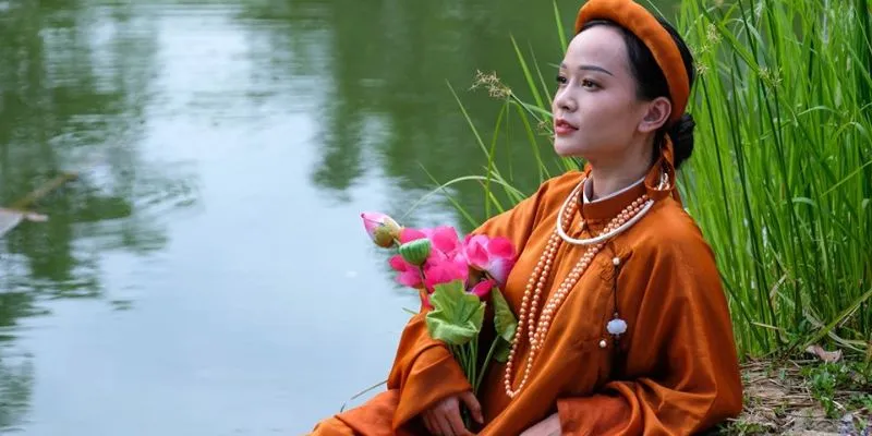 Ý nghĩa văn hóa sâu sắc ẩn bên trong chiếc áo giao lĩnh